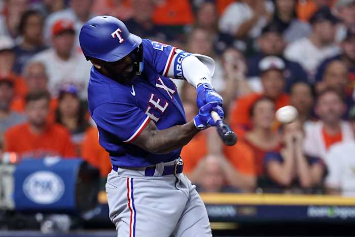 Oct 22, 2023; Houston, Texas, USA; Texas Rangers right fielder Adolis Garcia (53) hits a grand slam against the Houston Astros in the ninth inning during game six of the ALCS for the 2023 MLB playoffs at Minute Maid Park. Mandatory Credit: Troy Taormina-USA TODAY Sports